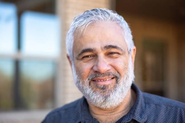 A beautiful red-haired woman smiling